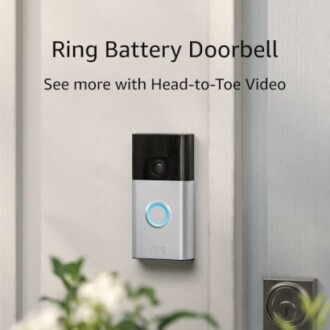 Ring battery doorbell mounted on a door.