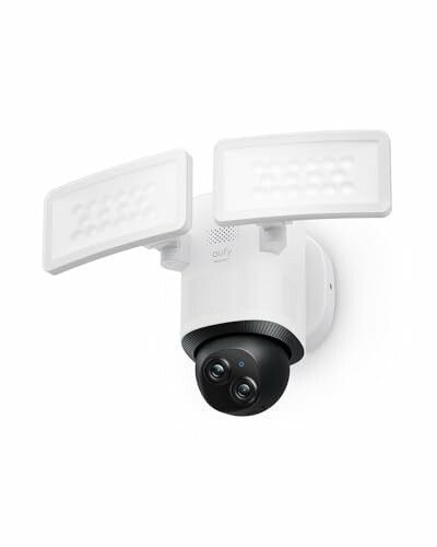 Security camera with dual LED lights mounted on a wall.