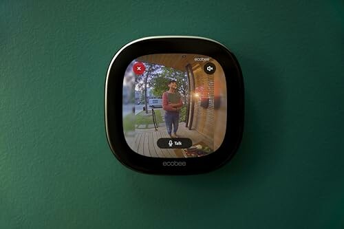 Smart thermostat displaying a video call interface.