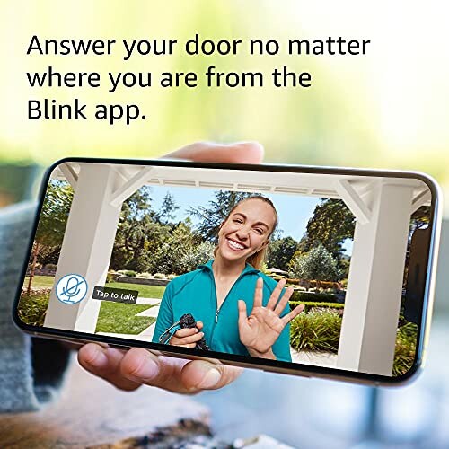 Person on smartphone screen using video doorbell app